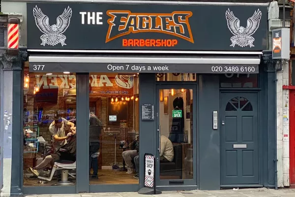 The Eagles Barber Shop Banner